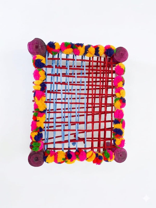 Colorful mini charpai bed top view